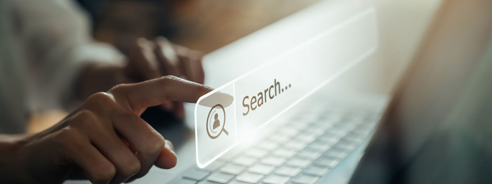 hand using laptop and press screen to search browsing on the internet online scaled e1623761830625